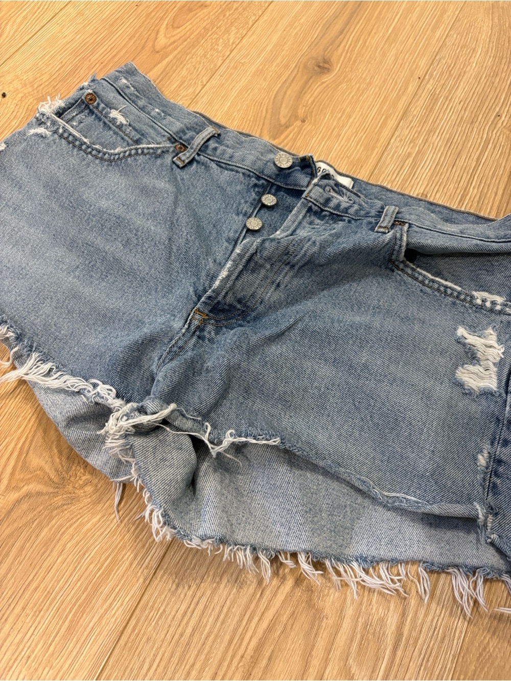Agolde Light Blue Frayed Hem Denim Shorts